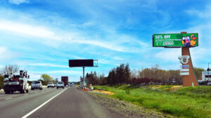 Dixon Billboard showing Quick Quack Carwash ad